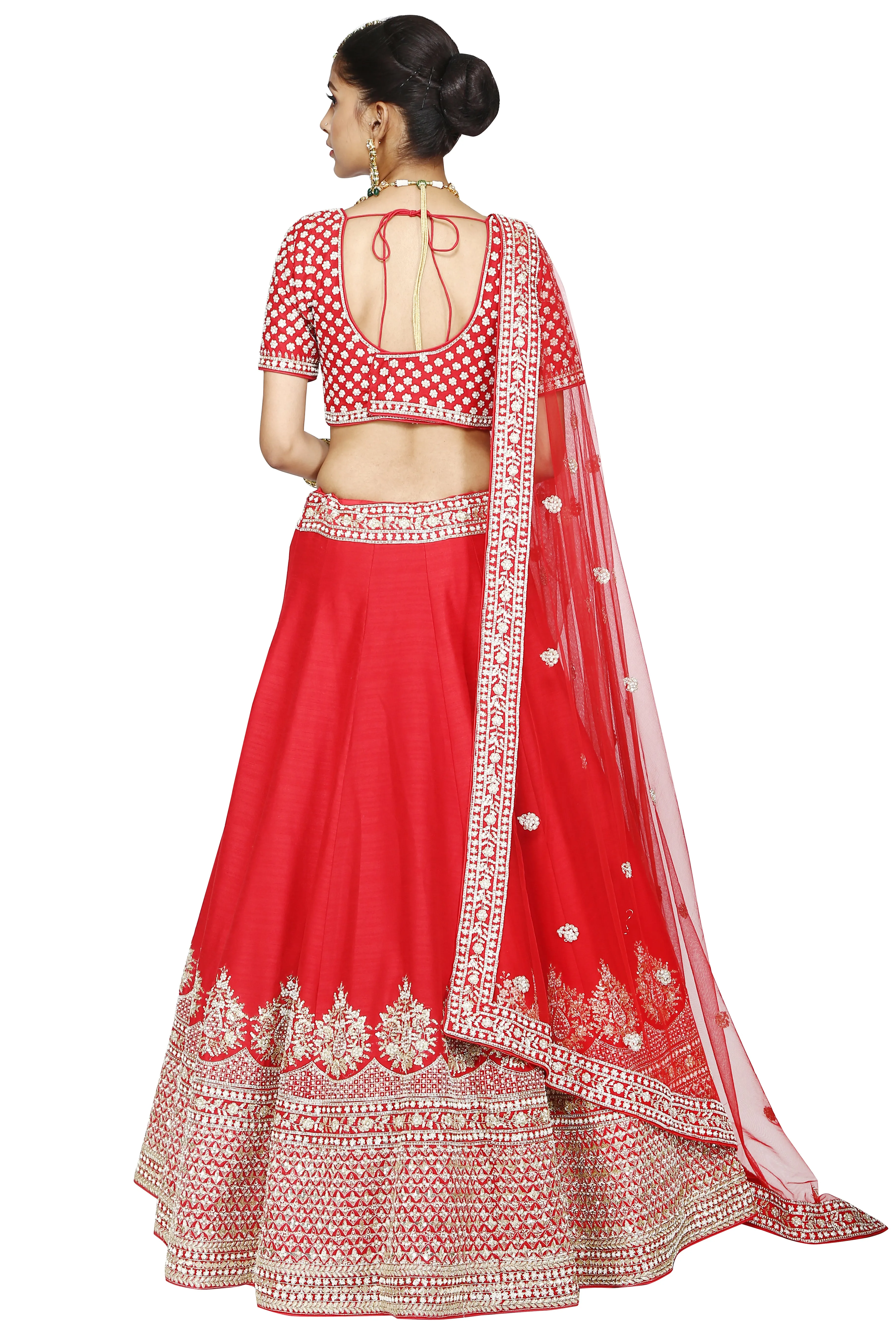 Bright red lehenga set.