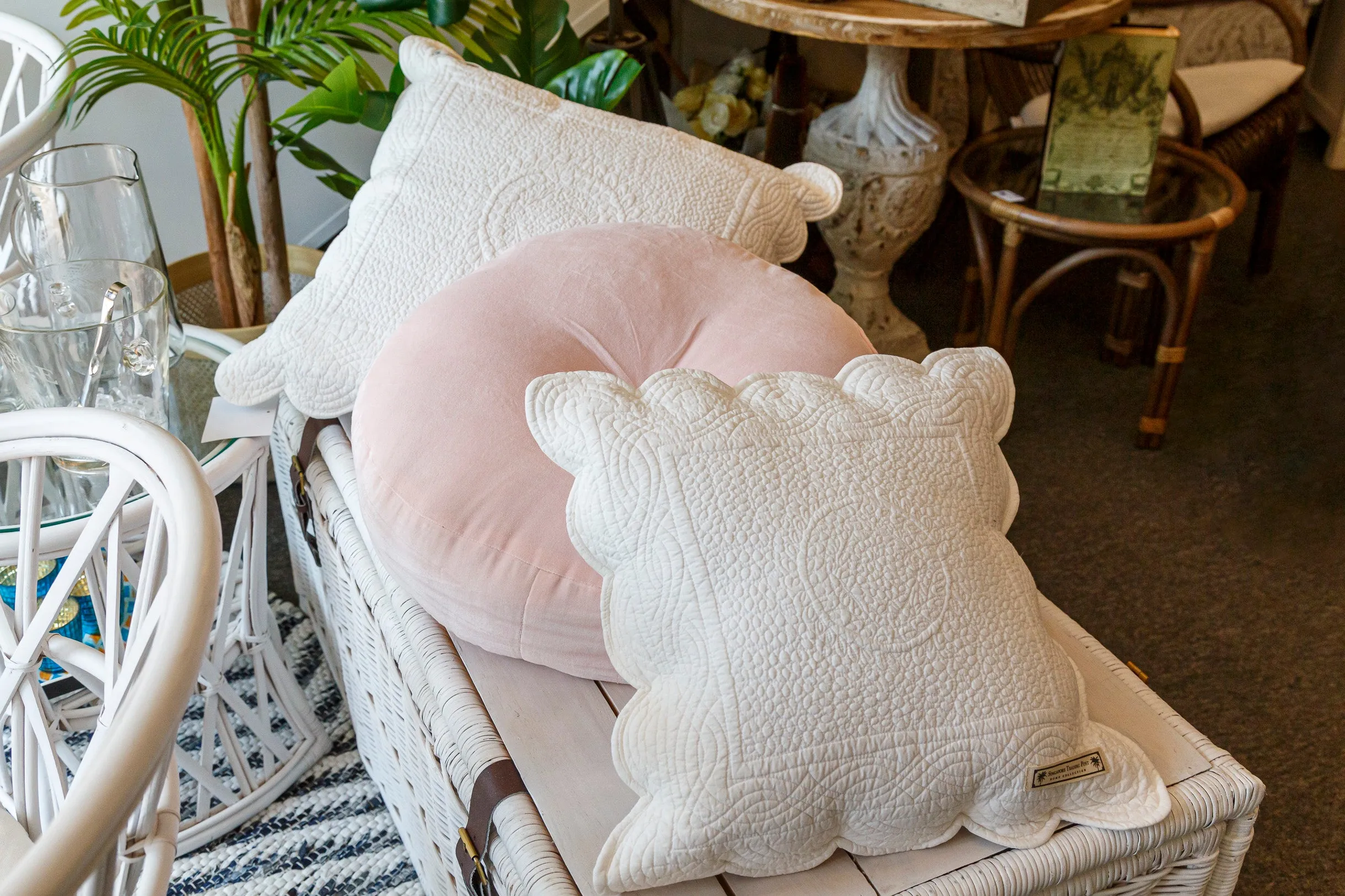 White quilted cushion with scallop edging